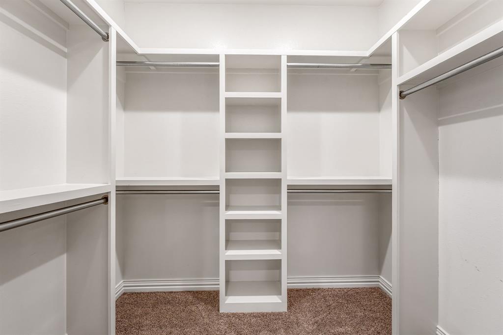 1501 Johnson Road, Unit A Iowa Park, TX 76367 - Photo 22 of 30 a view of an empty walk in closet