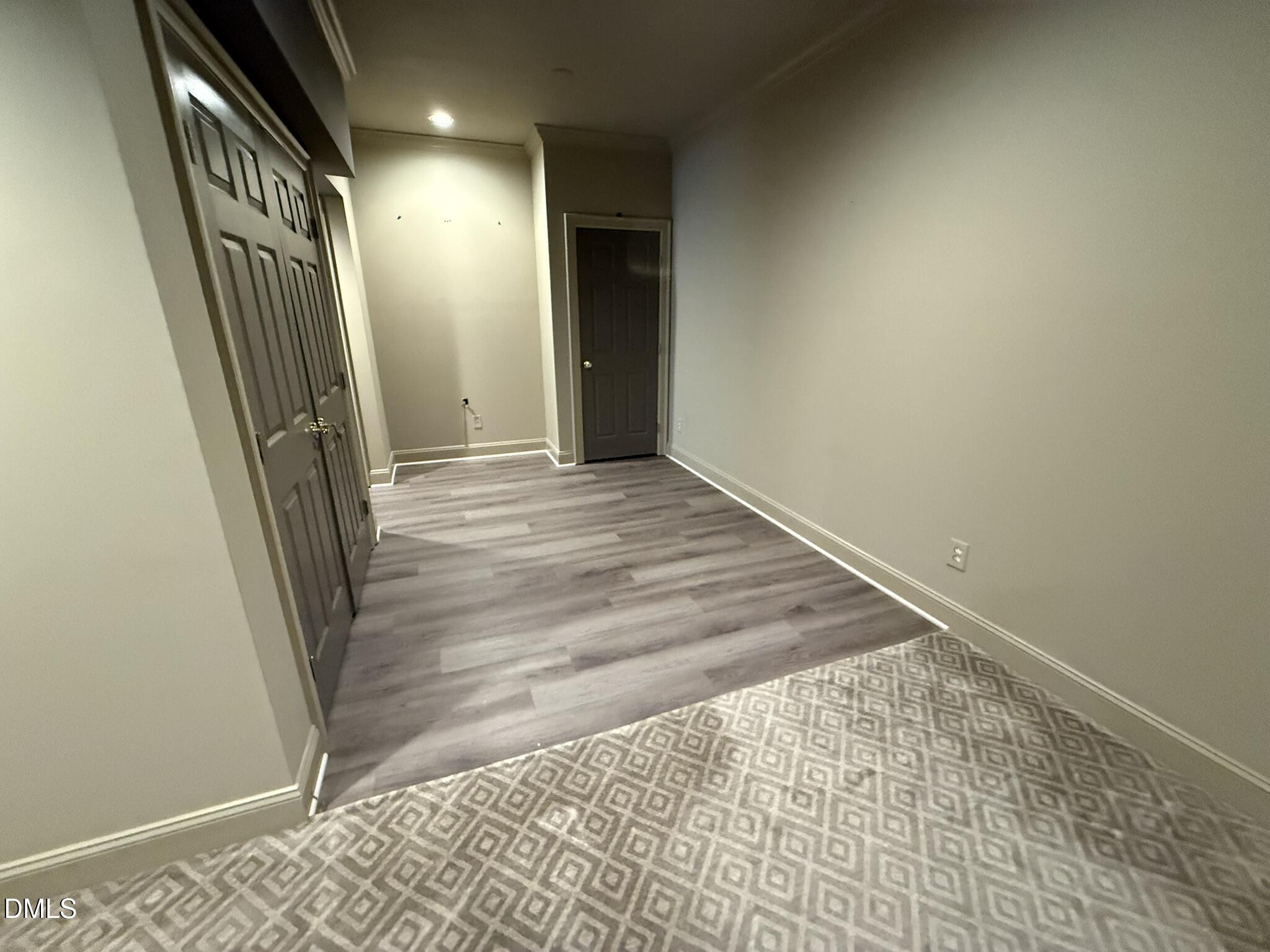 3617 Carlow Court Raleigh, NC 27612 - Photo 27 of 30 a view of hallway with stairs