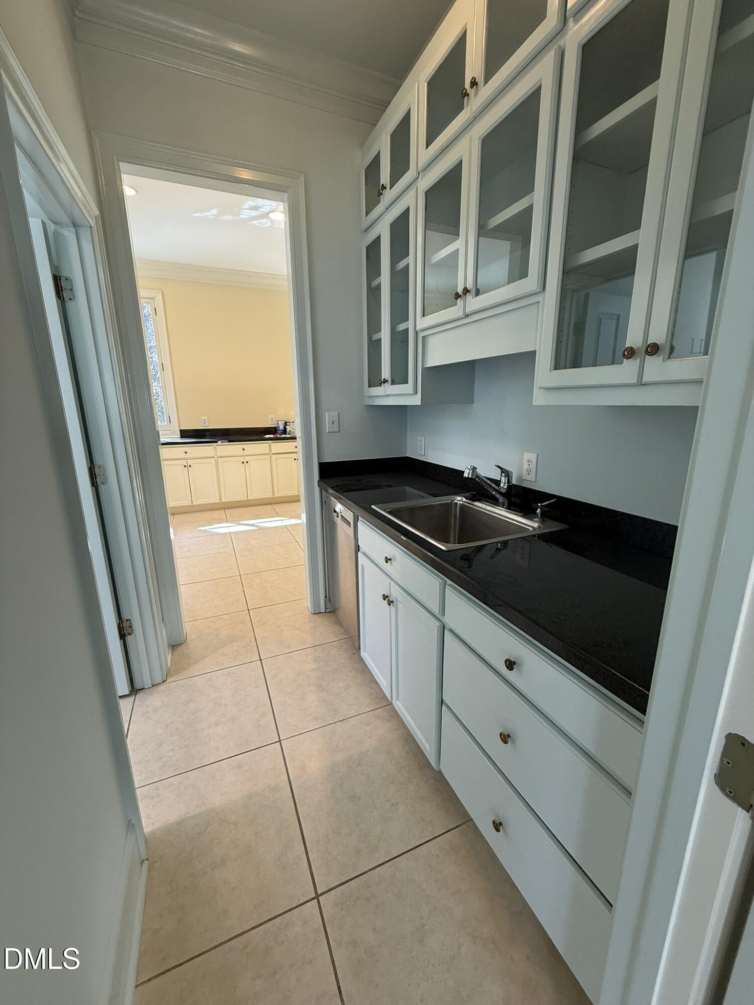 3617 Carlow Court Raleigh, NC 27612 - Photo 10 of 30 a kitchen with a sink and a stove top oven