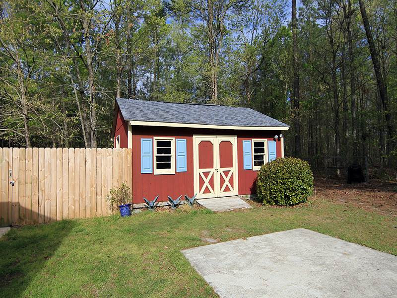 4117 Lassiter Road Wake Forest, NC 27587 - Photo 15 of 22 One of two outbuildings, this home has lots of storage. Storage Shed