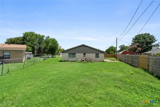 a house view with a garden space