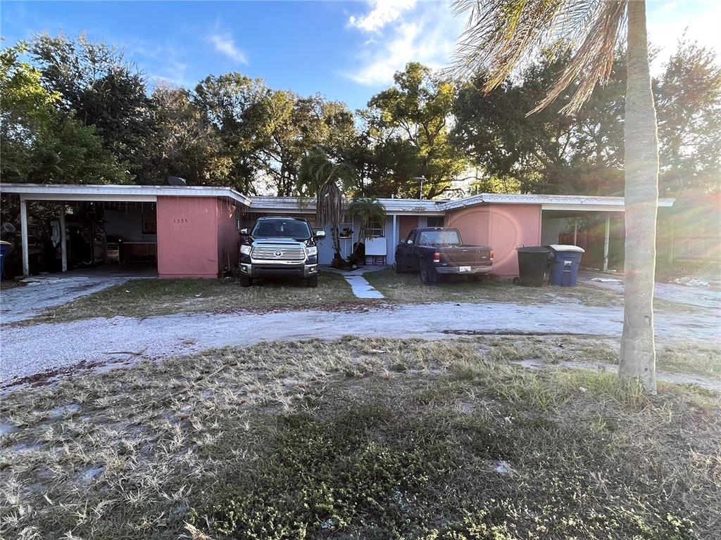 1353 Lakeview Road Clearwater, FL 33756 - Photo 1 of 1 a view of a house with a yard