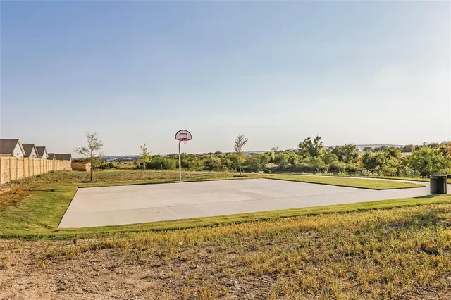 a view of a swimming pool with an ocean view