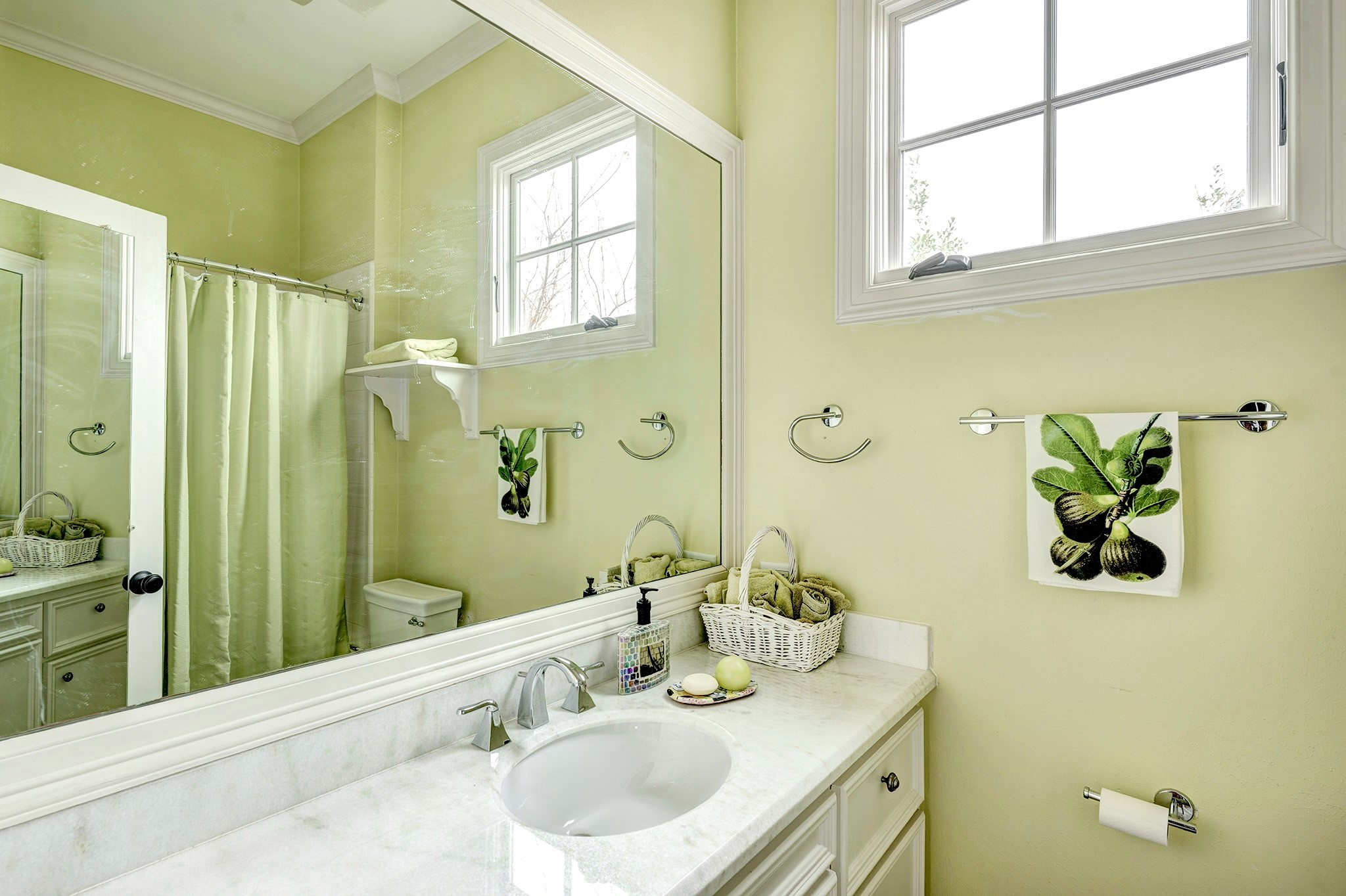 3744 Inwood Drive Houston, TX 77019 - Photo 28 of 32 a bathroom with a granite countertop sink a toilet and a mirror