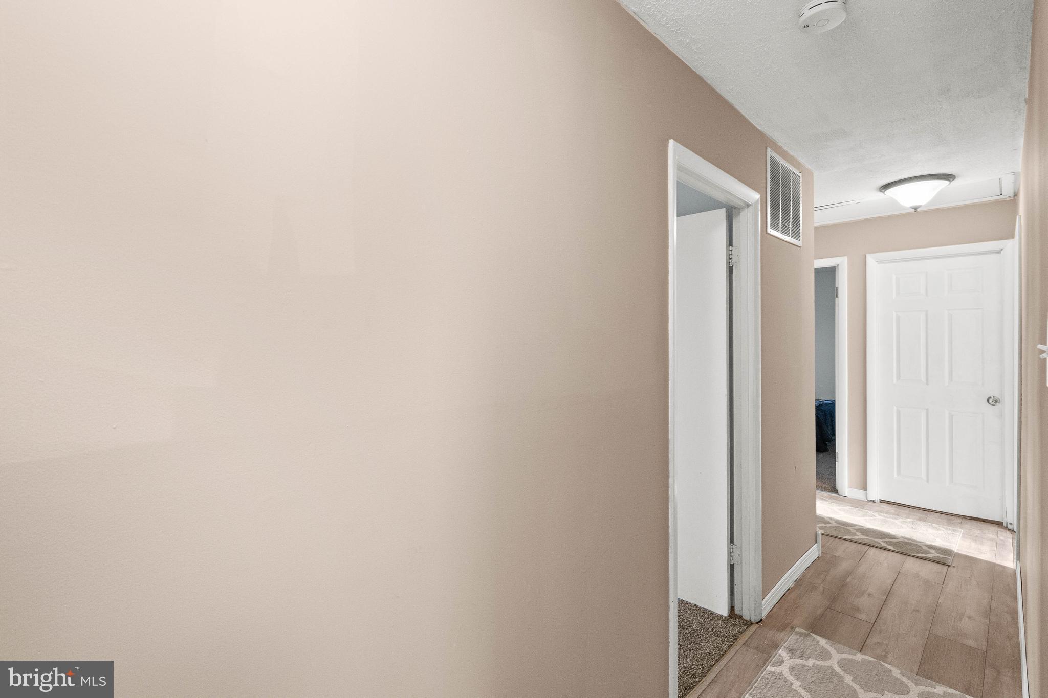 1327 Greyswood Road Odenton, MD 21113 - Photo 14 of 29 Upper Hallway with Wide Plank Flooring