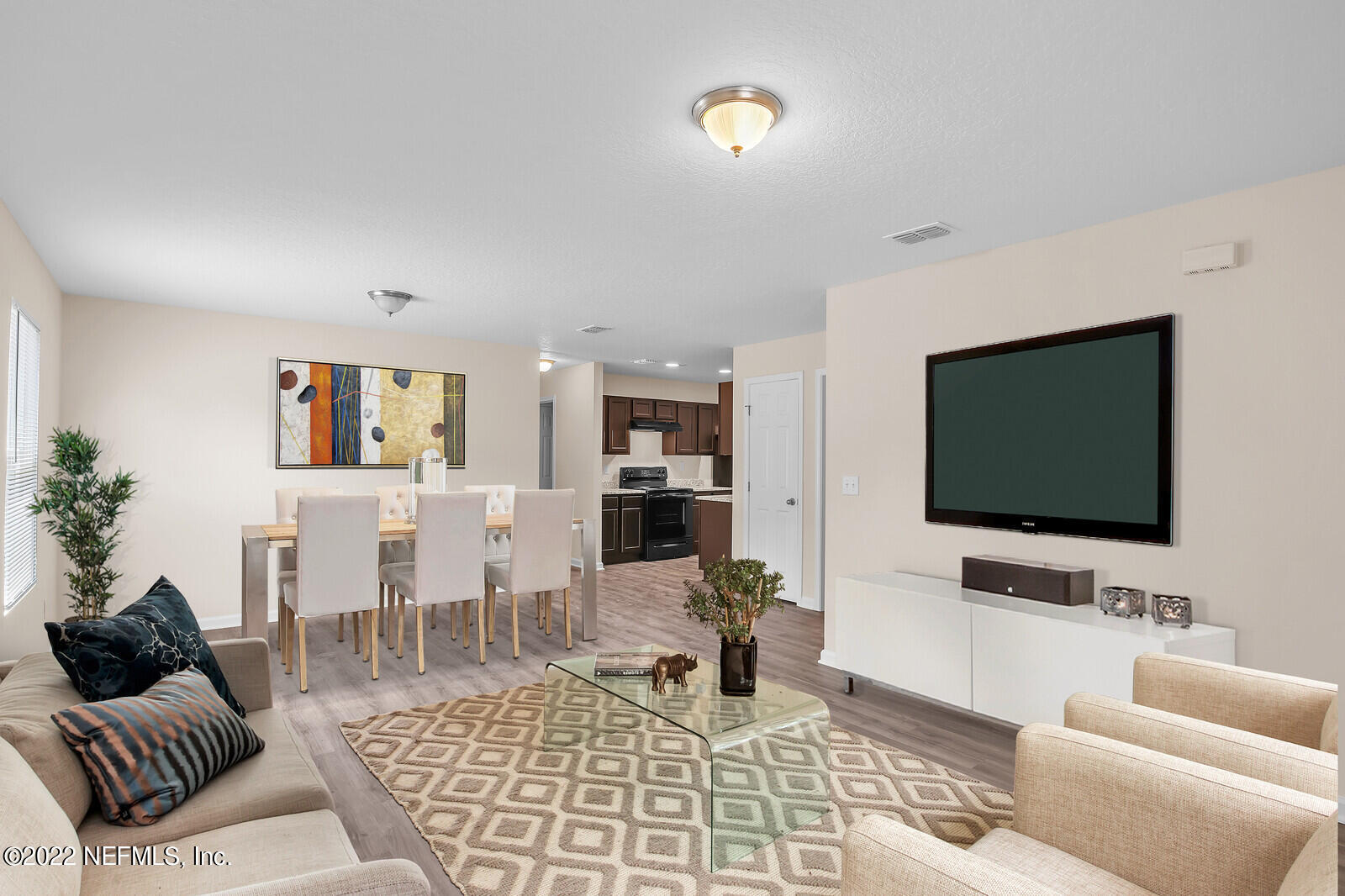8305 Firetower Road Jacksonville, FL 32210 - Photo 2 of 21 Living Room to Dining