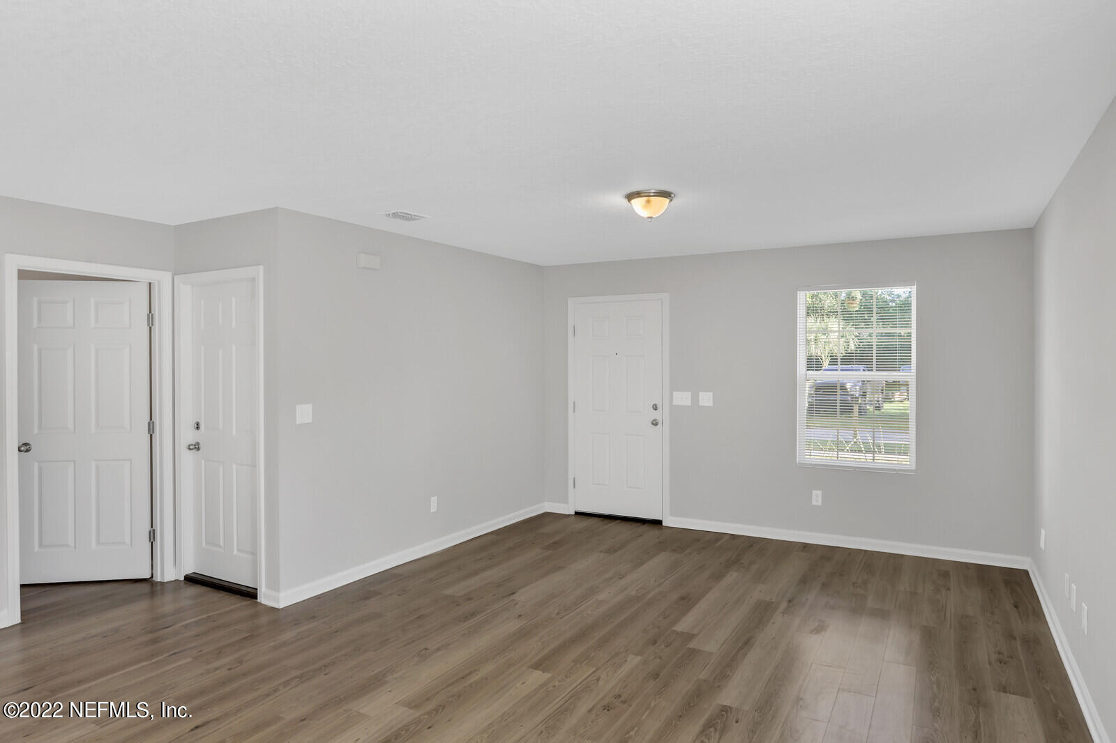 8305 Firetower Road Jacksonville, FL 32210 - Photo 3 of 21 Dining to Living Room
