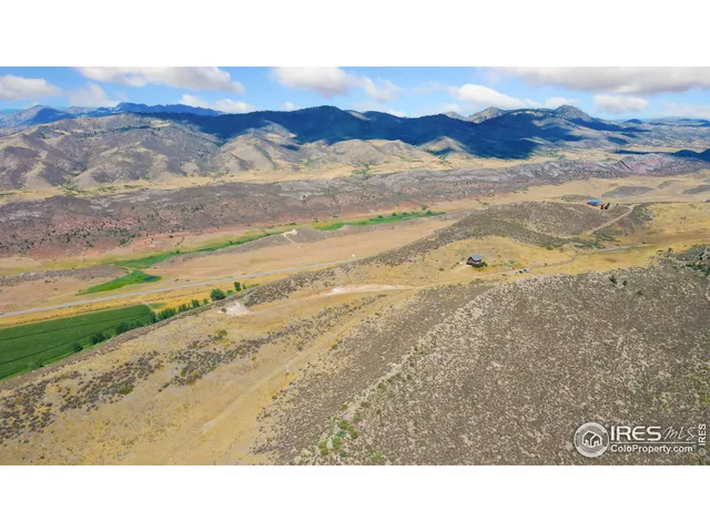 a view of an ocean and a mountain
