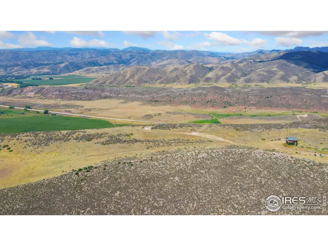a black and white photo of a beach
