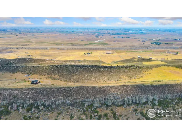 a black and white photo of a beach