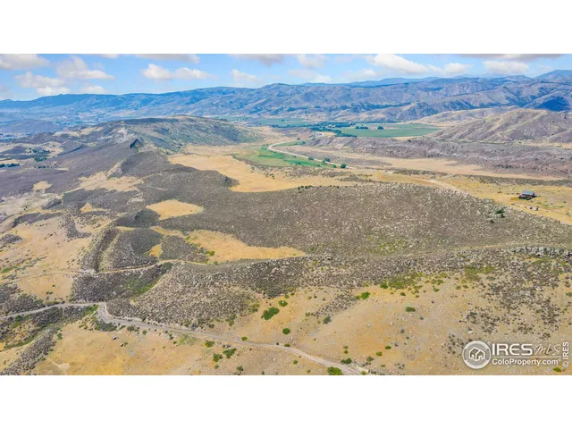 a black and white photo of a beach