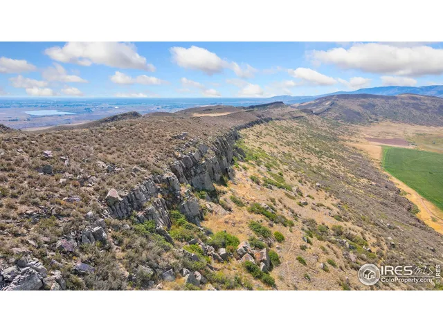 a black and white photo of a mountain
