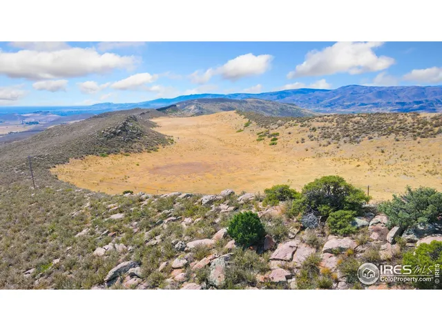 a view of an ocean and mountain