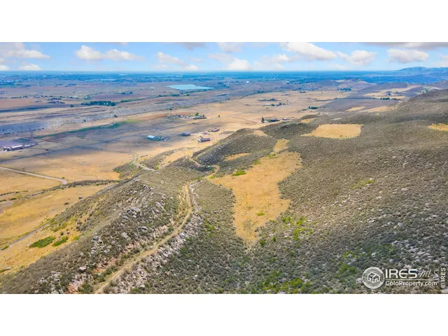a view of an ocean and mountain
