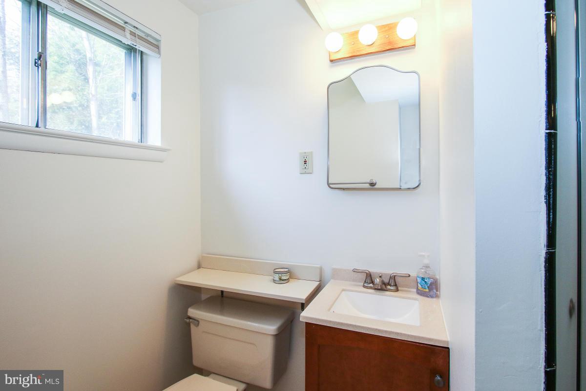 7708 Beech Tree Road Bethesda, MD 20817 - Photo 21 of 30 a utility room with dryer and washer
