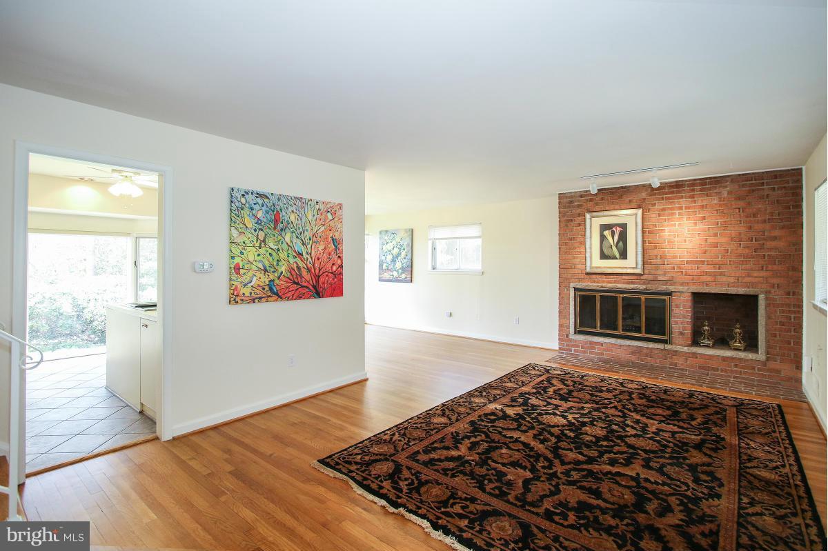7708 Beech Tree Road Bethesda, MD 20817 - Photo 4 of 30 a living room with wooden floor and a window