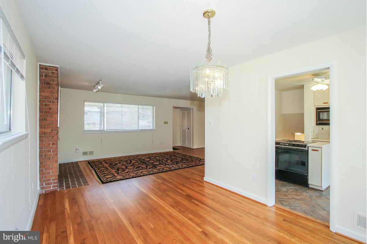 7708 Beech Tree Road Bethesda, MD 20817 - Photo 8 of 30 a view of a room and wooden floor
