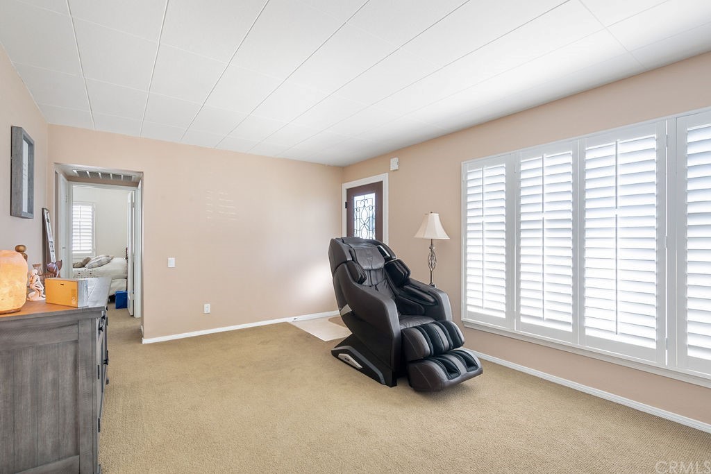 671 Olive Street Upland, CA 91786 - Photo 7 of 47 a room with furniture and a large window