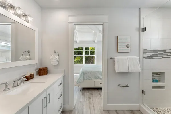 a bathroom with a sink and a mirror