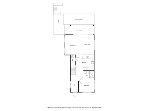 a picture of a bench in front of a gate