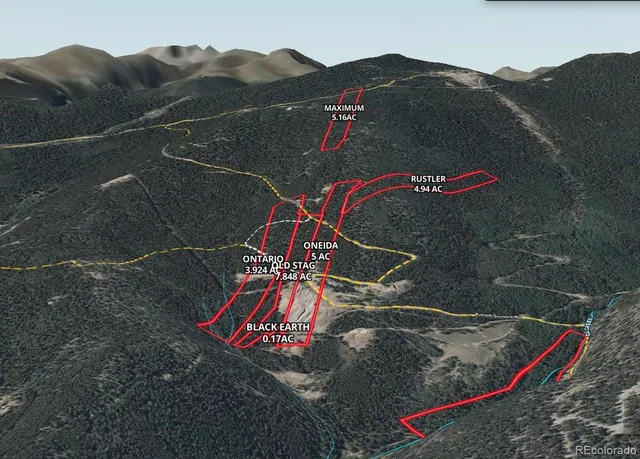 a view of an aerial view of residential houses with a lake and mountain view