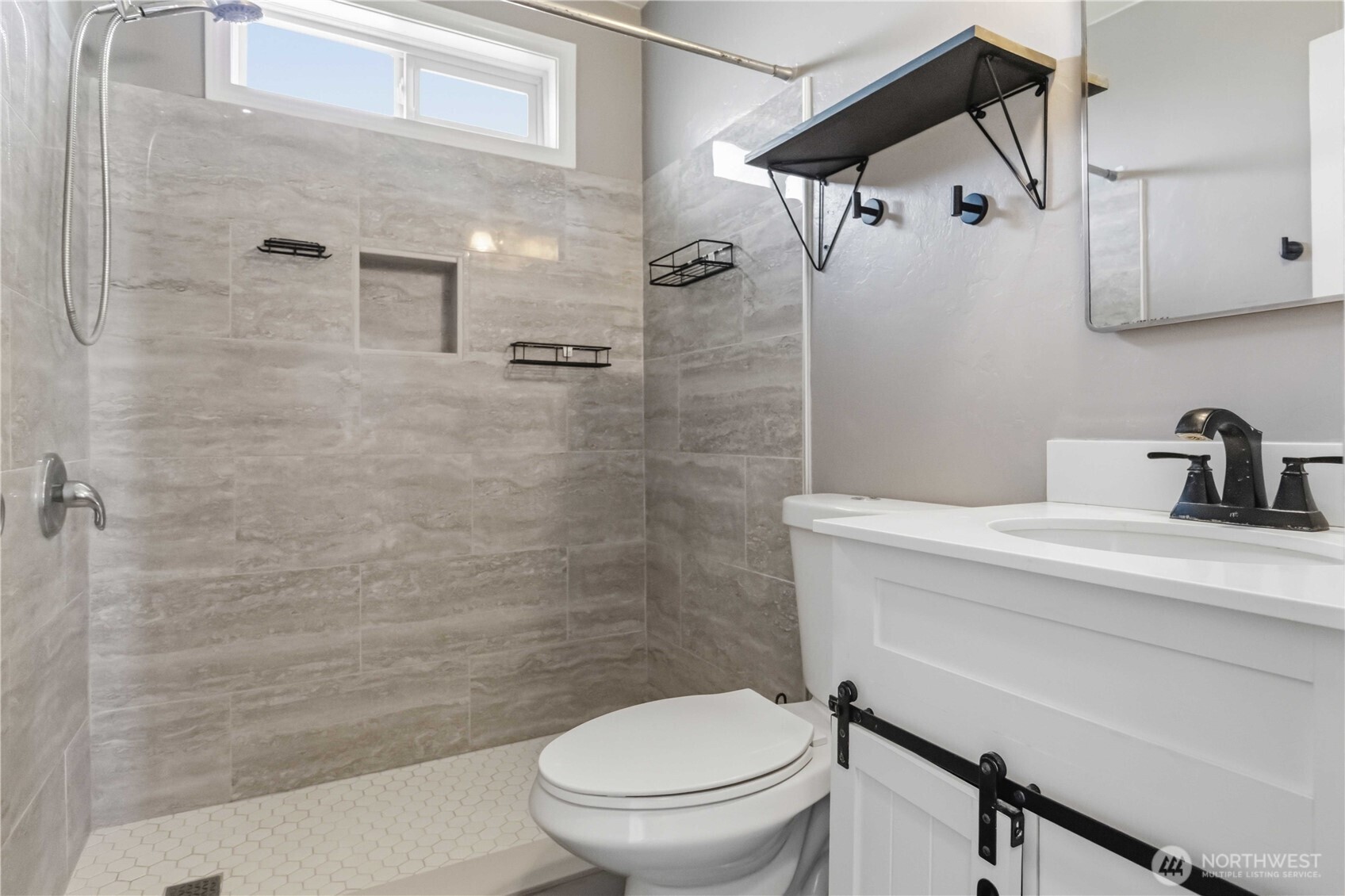 356 28th Avenue Longview, WA 98632 - Photo 16 of 24 a bathroom with a toilet and a shower