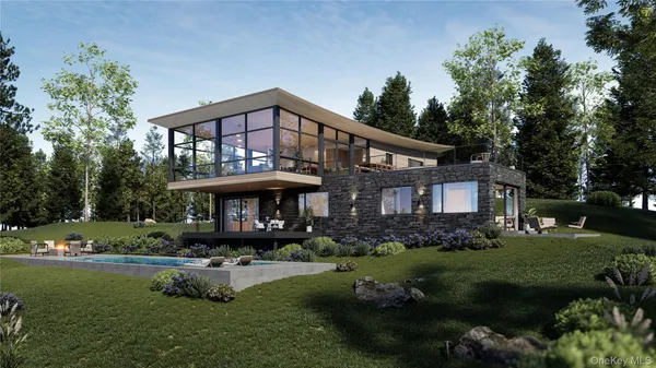 a front view of a house with a garden and trees