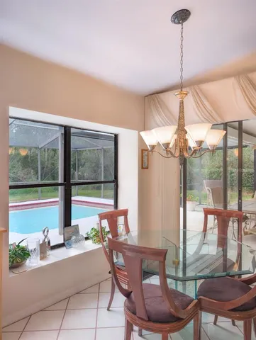 a bedroom with a bed and a mirror