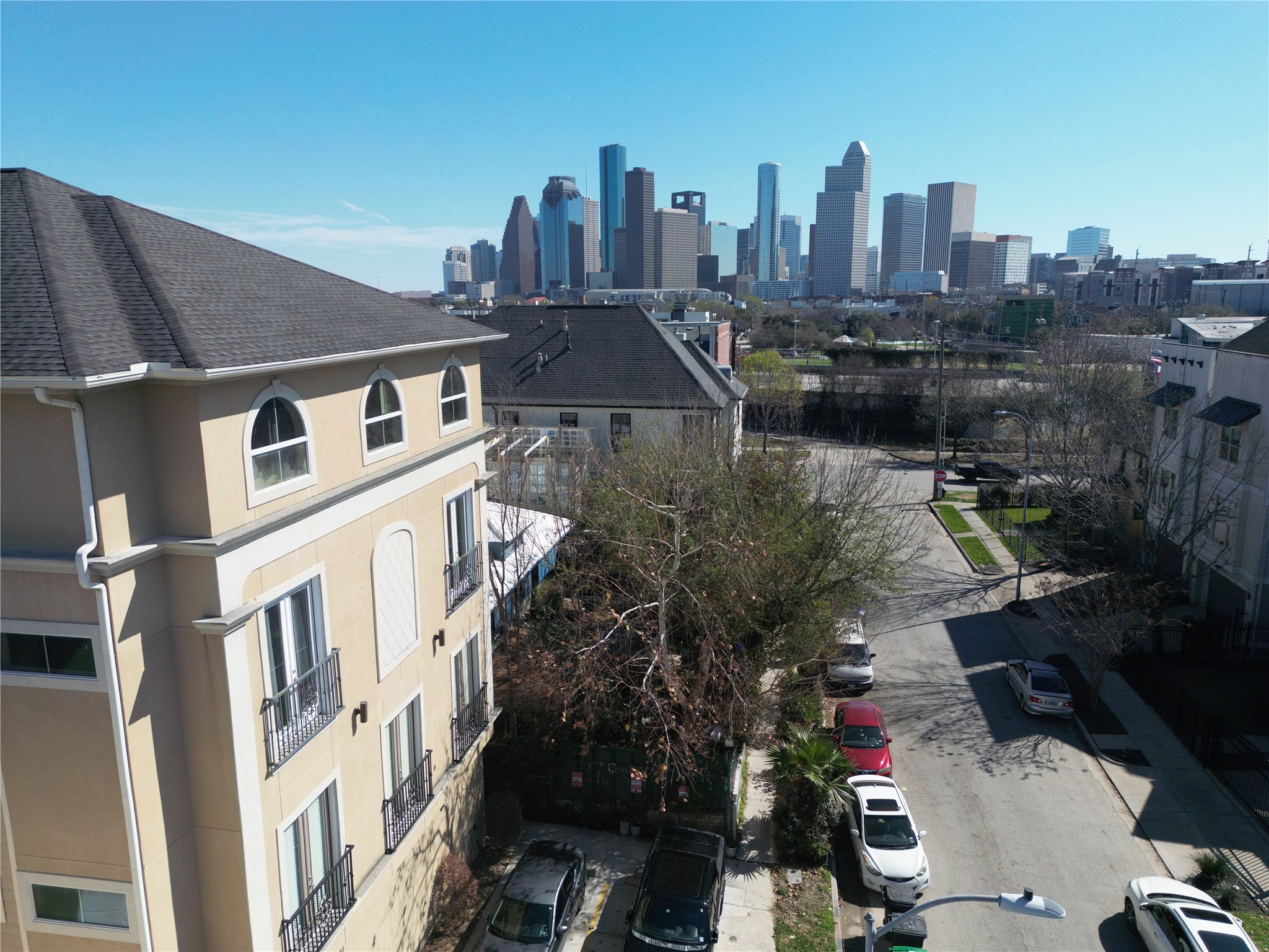 314 West Bell Street, Unit 201 Houston, TX 77019 - Photo 2 of 32 a view of a city with tall buildings