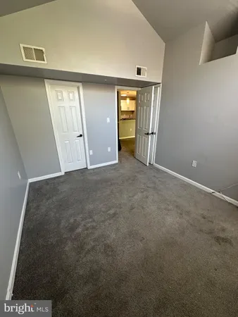 an empty room with closet