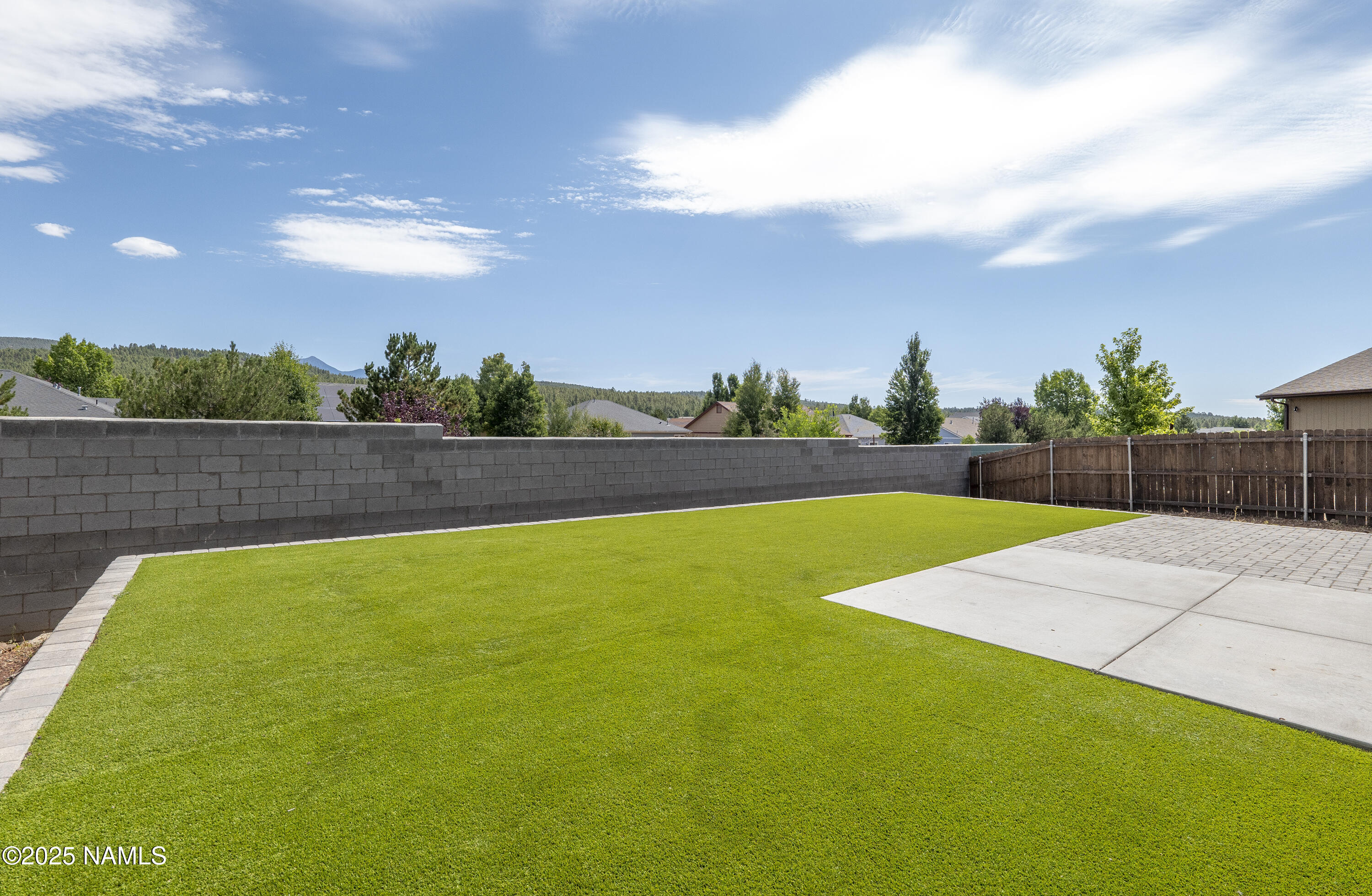 11900 Hydrus Road Bellemont, AZ 86015 - Photo 30 of 34 with retaining wall