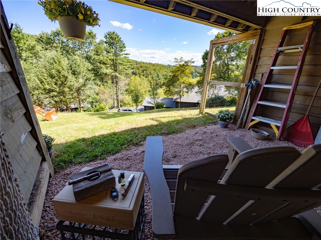 165 All Hallows Road Boone, NC 28607 - Photo 8 of 50 a view of a backyard with hardwood