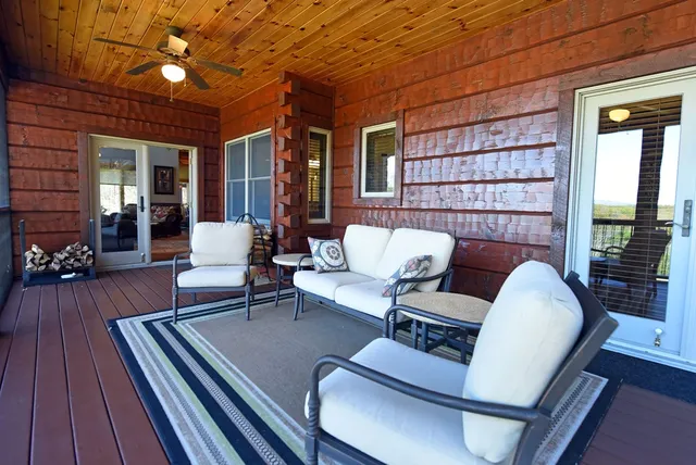 a front view of a house with wooden floor