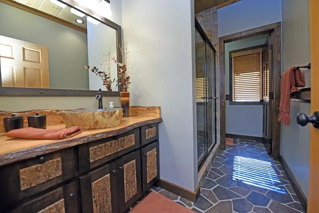 a view of a swimming pool with an outdoor seating and a yard