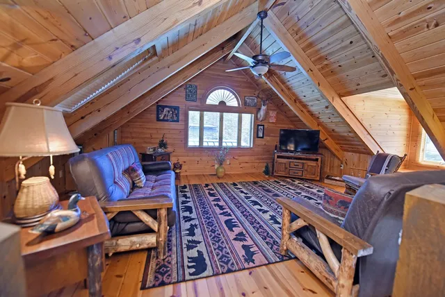 a view of a swimming pool with a yard