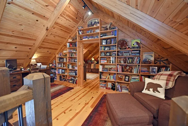 a view of a small house with a yard