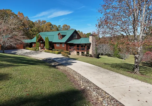 a kitchen with stainless steel appliances granite countertop a stove and cabinets