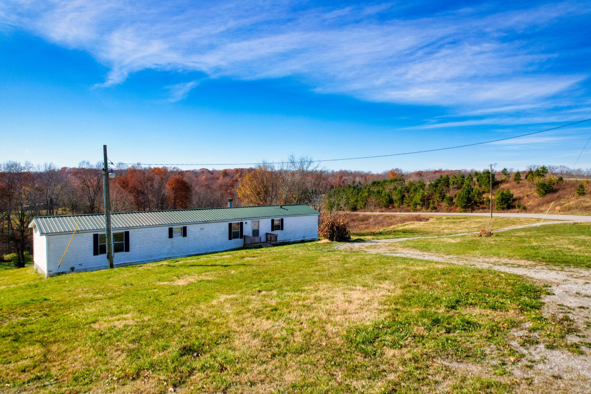 3925 Mobley's Cut Road Columbia, TN 38401 - Photo 9 of 15 a view of a large pool with an outdoor seating and a yard