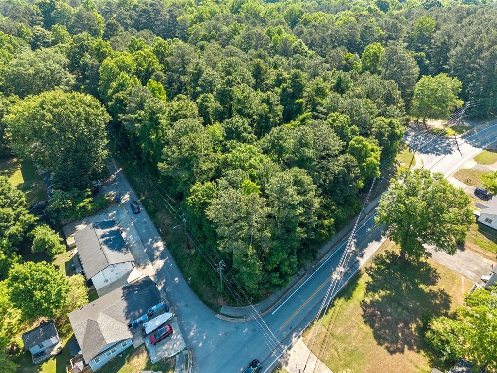 5305 Sycamore Road Sugar Hill, GA 30518 - Photo 12 of 22 an aerial view of a residential houses with yard