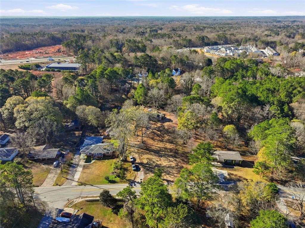 5305 Sycamore Road Sugar Hill, GA 30518 - Photo 17 of 18 an aerial view of residential houses with outdoor space