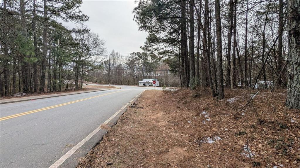 5305 Sycamore Road Sugar Hill, GA 30518 - Photo 5 of 18 a view of a backyard of the house
