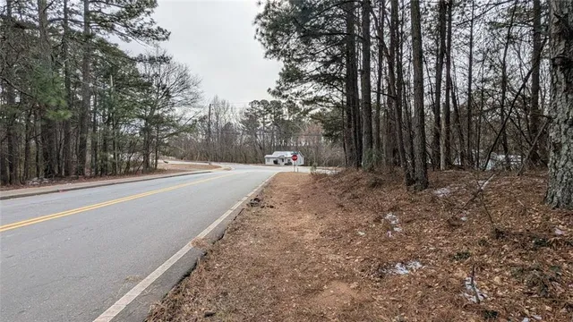 a view of a backyard of the house