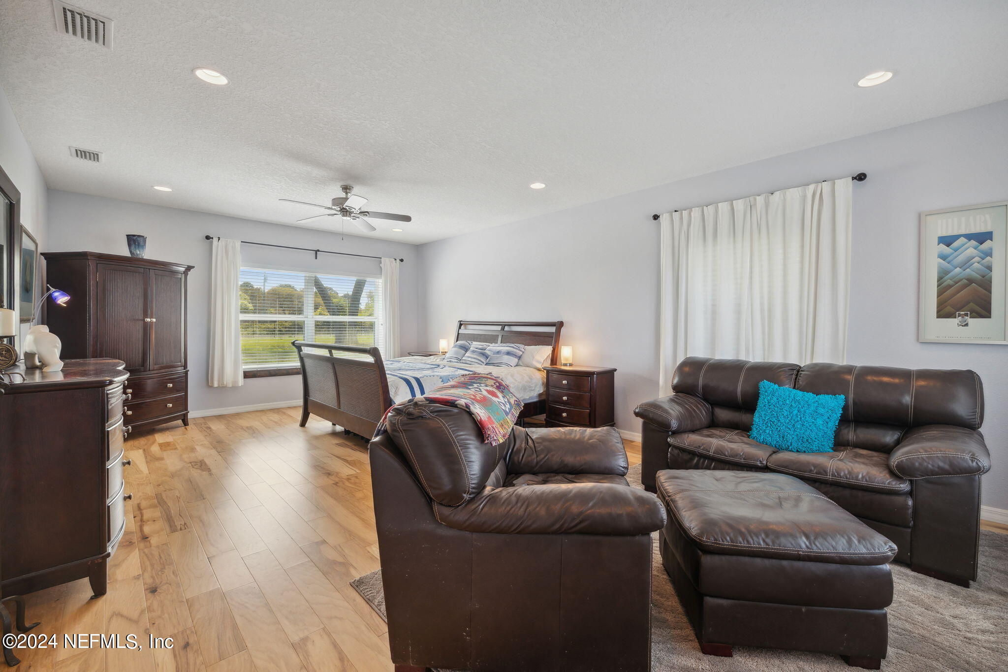 16045 Shellcracker Road Jacksonville, FL 32226 - Photo 17 of 40 a living room with furniture and a large window