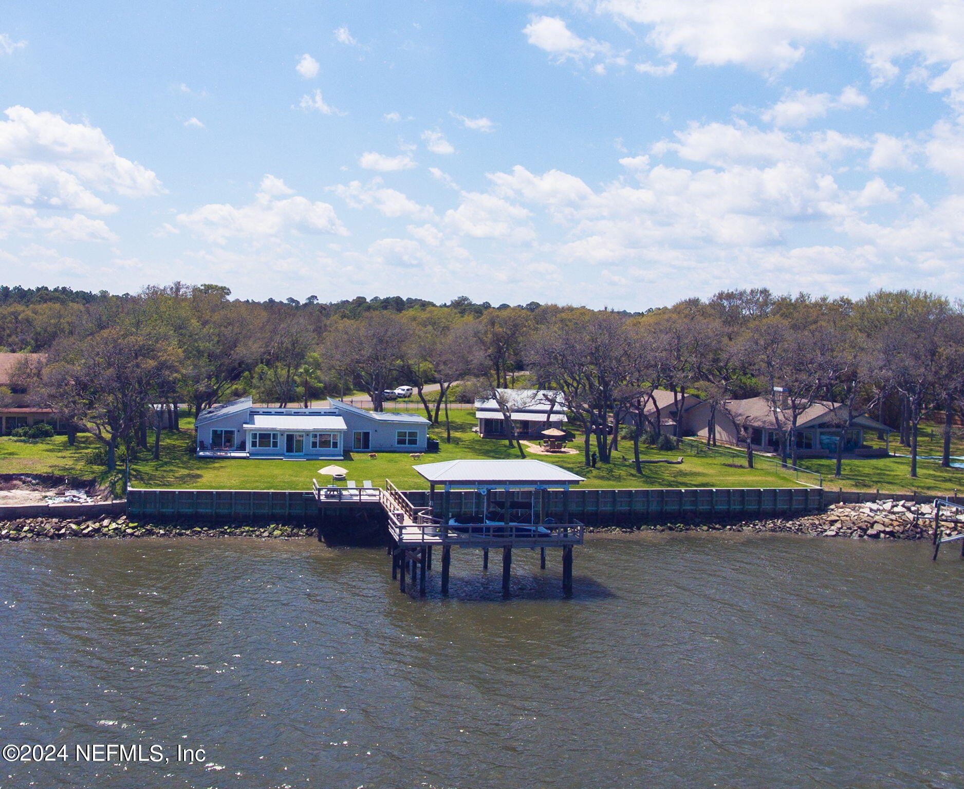 16045 Shellcracker Road Jacksonville, FL 32226 - Photo 2 of 40 an aerial view of a house with a lake view