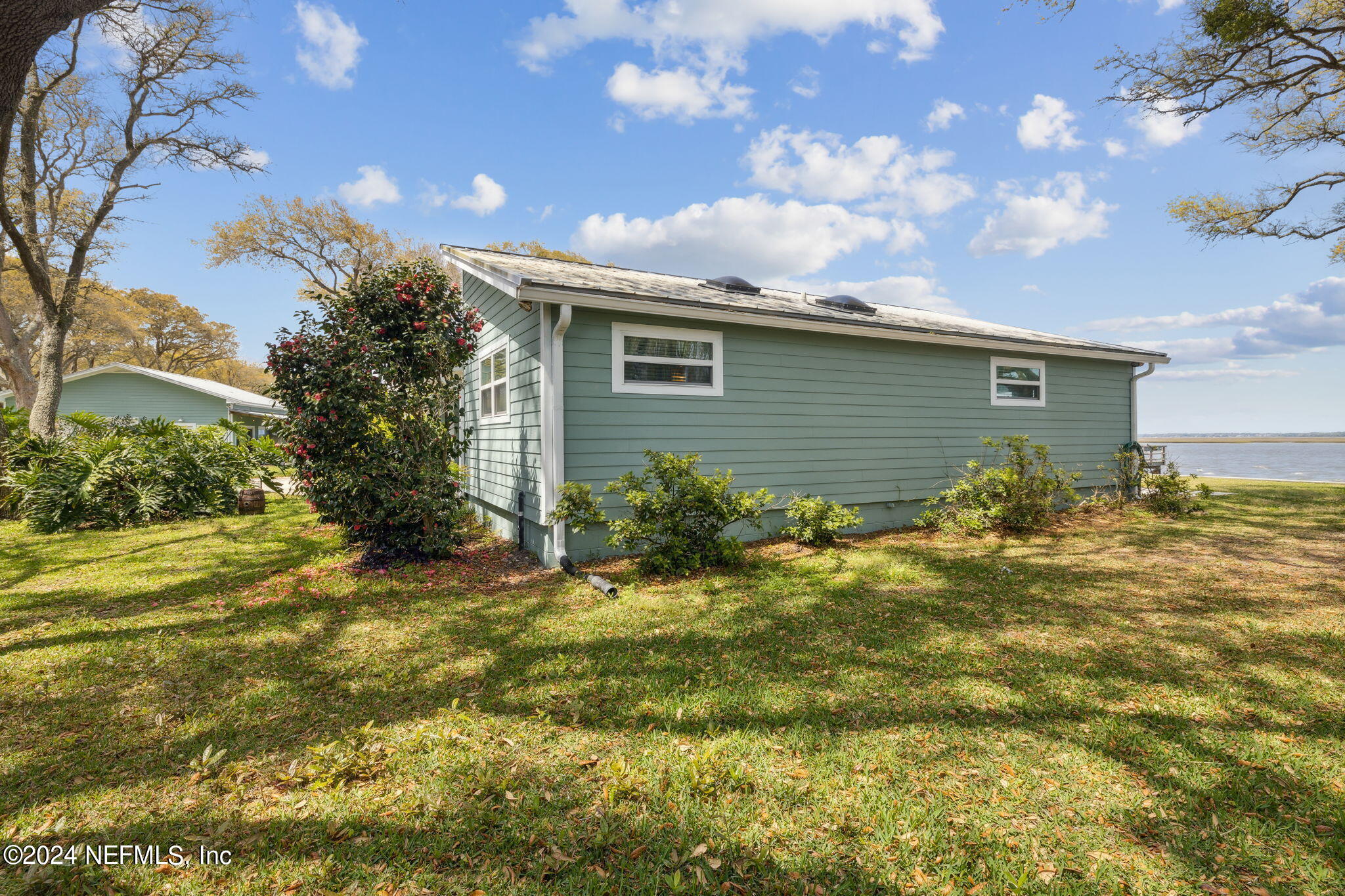 16045 Shellcracker Road Jacksonville, FL 32226 - Photo 28 of 40 a view of a house with a yard