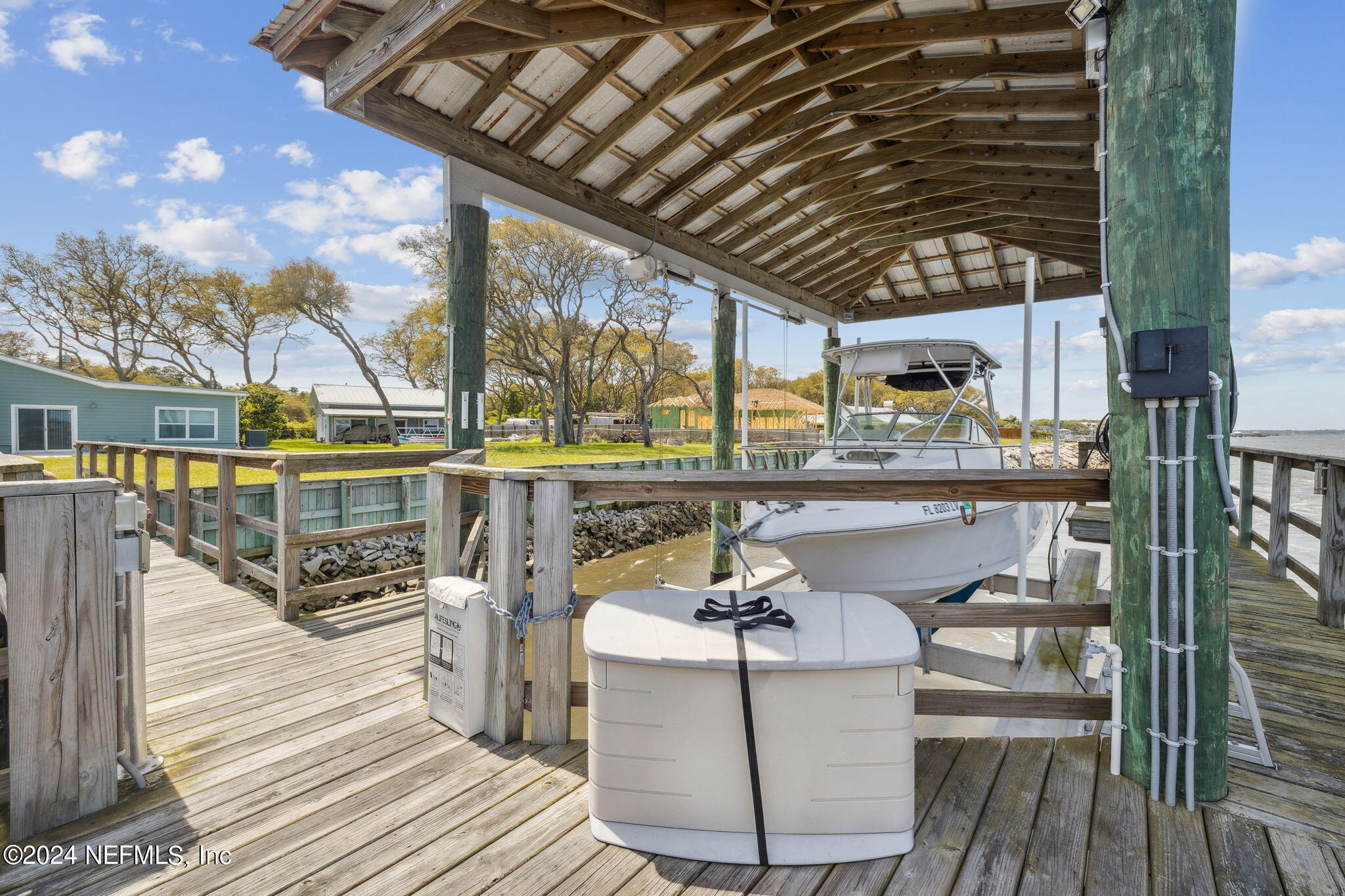 16045 Shellcracker Road Jacksonville, FL 32226 - Photo 36 of 40 a roof deck with table and chairs