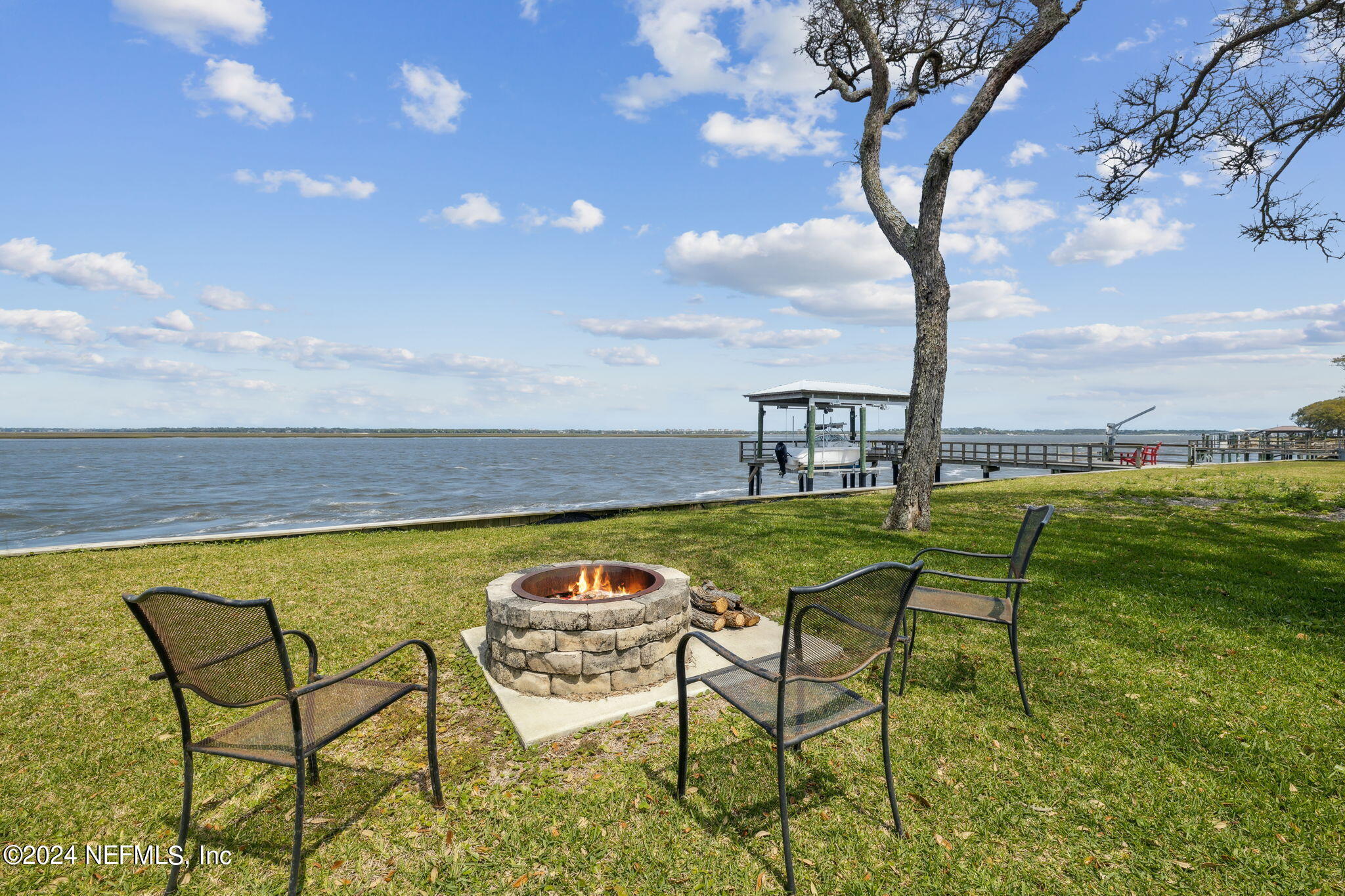 16045 Shellcracker Road Jacksonville, FL 32226 - Photo 39 of 40 a view of swimming pool with table and chairs