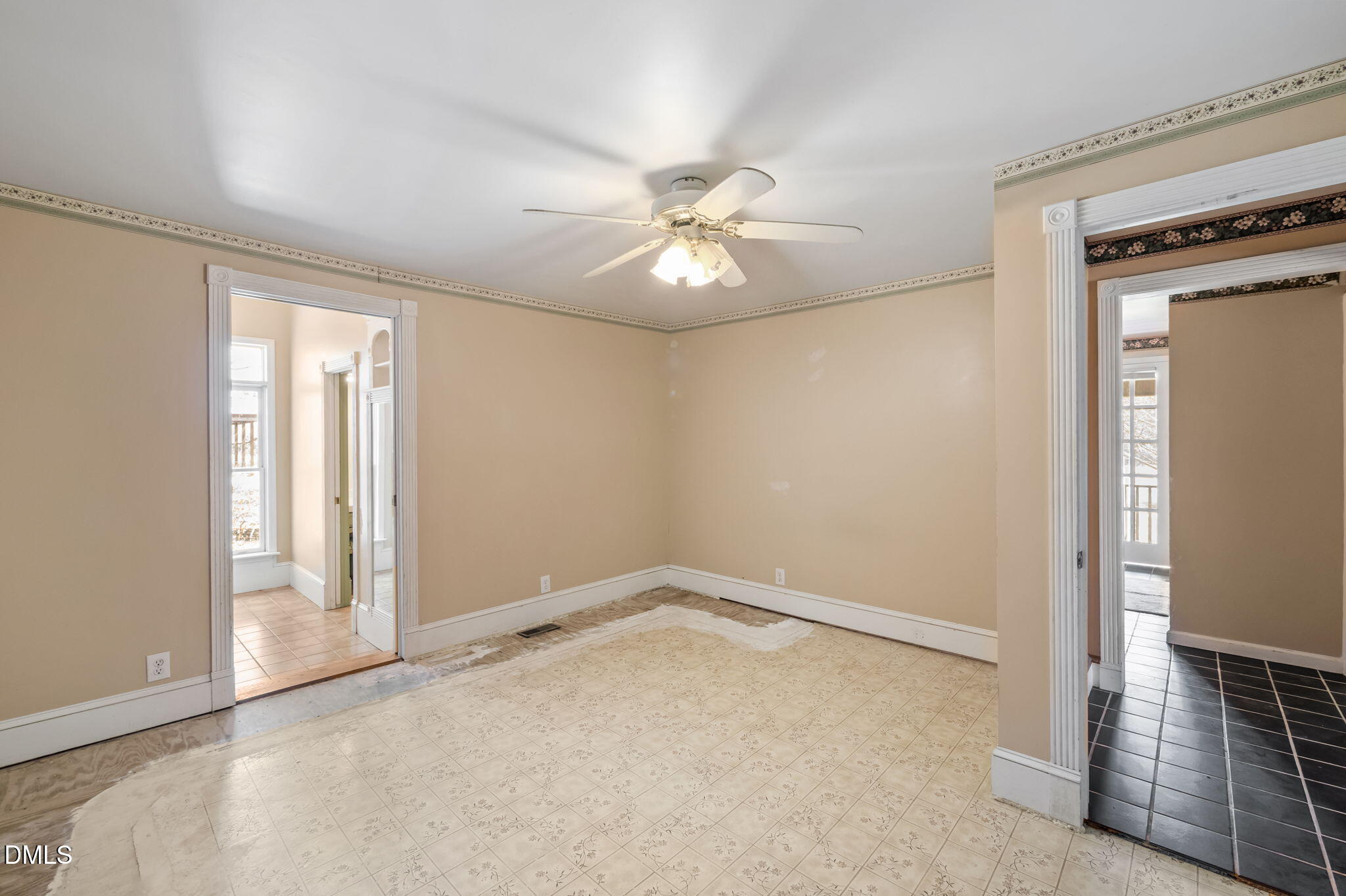 212 Thomas Humphries Road Roxboro, NC 27574 - Photo 29 of 56 an empty room with windows and fan