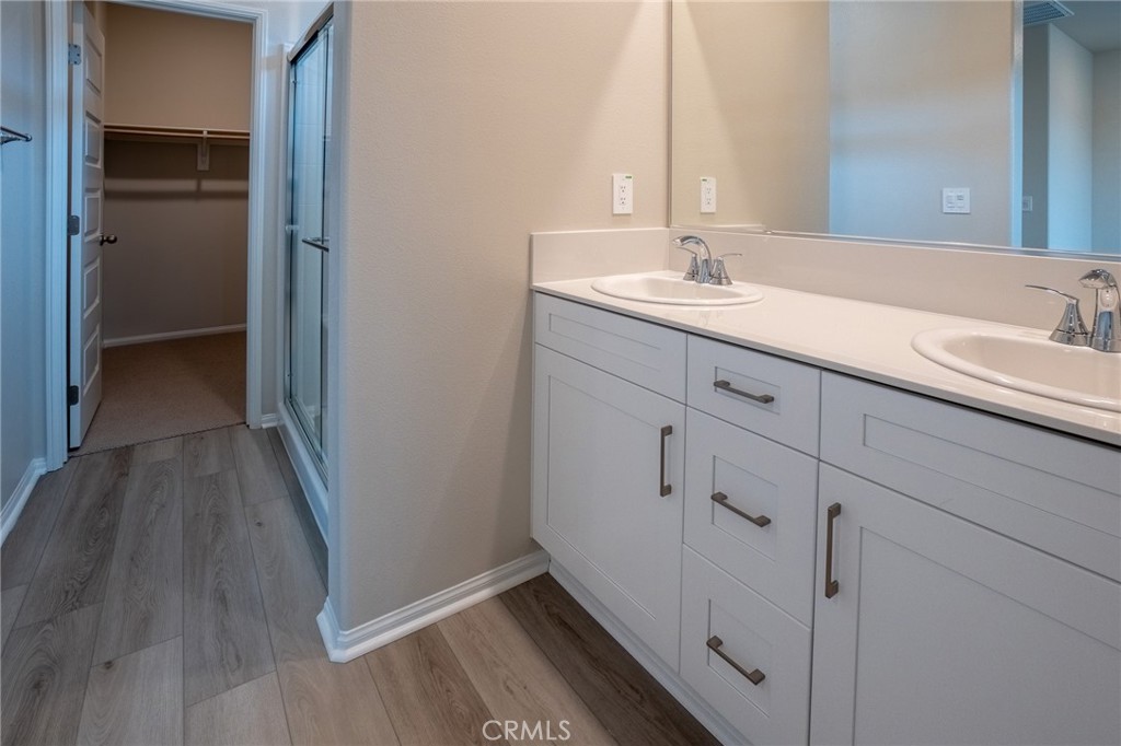 28586 Via Roble Temecula, CA 92591 - Photo 13 of 18 a bathroom with a sink and a mirror