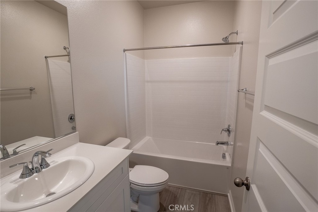 28586 Via Roble Temecula, CA 92591 - Photo 17 of 18 a bathroom with a sink toilet and shower